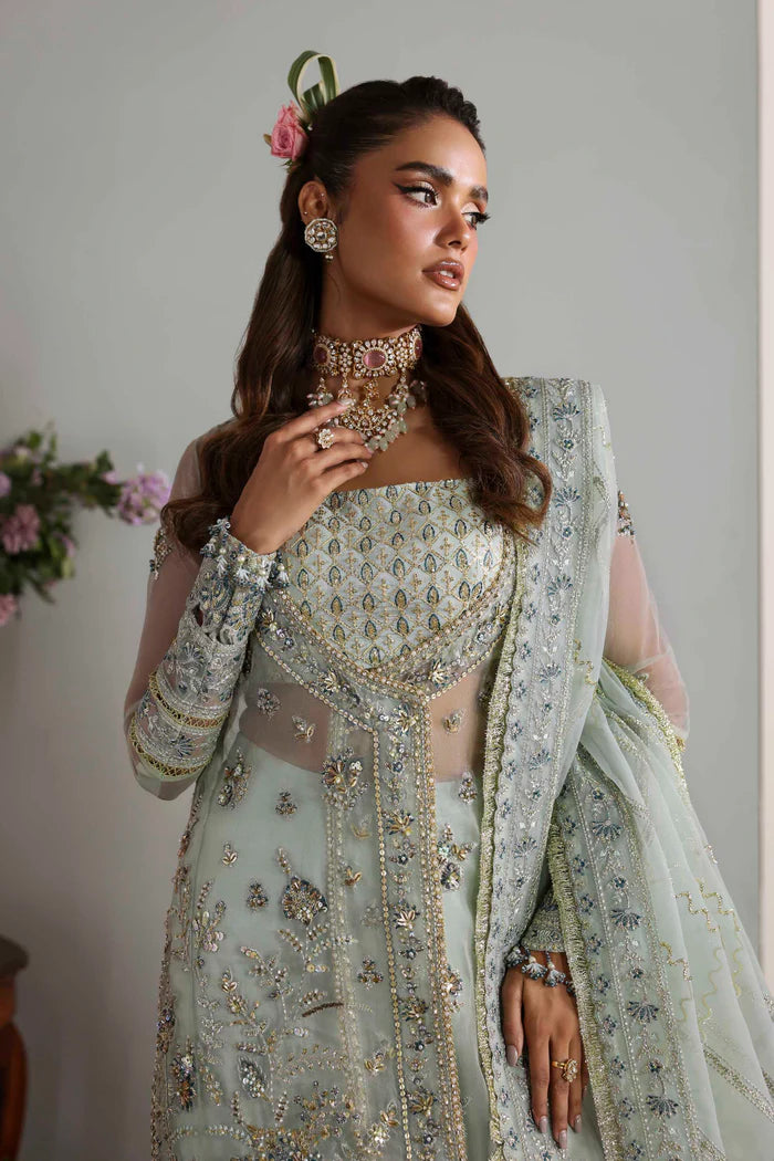 Aetheria luxury pastel mint organza long shirt dress with trousers and dupatta by Akbar Aslam, hand-embellished outfit for wedding guests and parties.