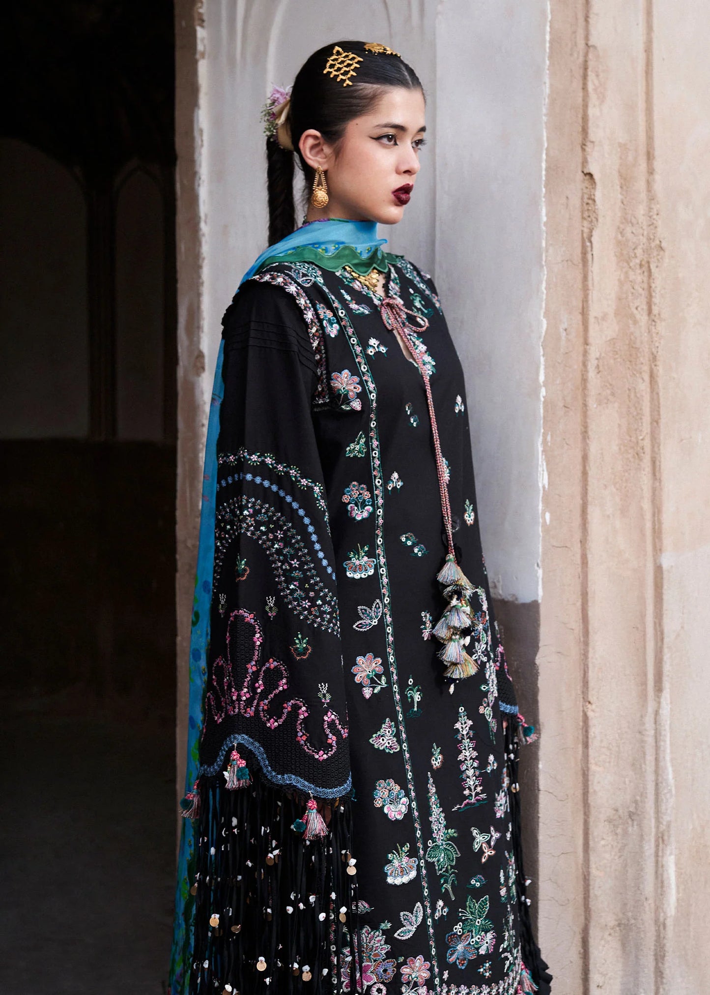 Arzo-Classic black suit with colorful floral threadwork by-Hussain rehar