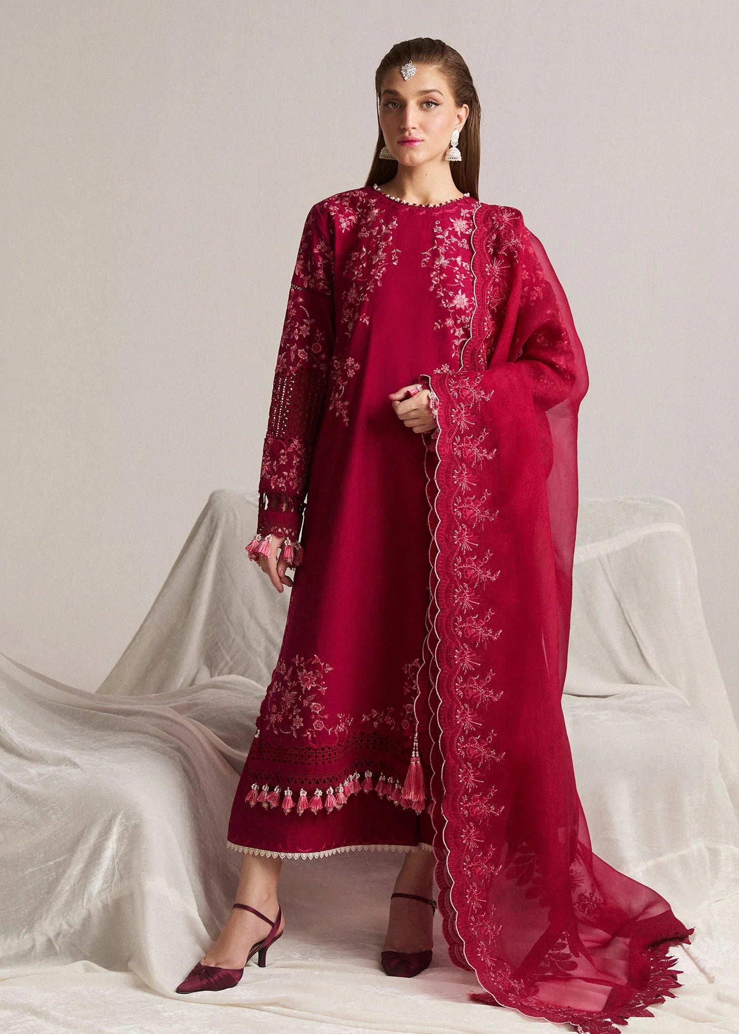 hussain rehar red dress Hussain Rehar | @maheenhsiddiqui stuns as the perfect bride in a customized Hussain Rehar red ensemble, beautifully highlighted with golden details. This