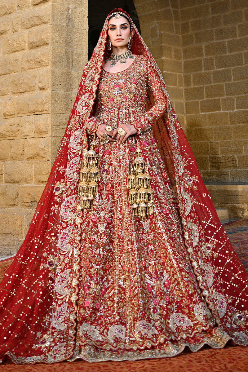 Crimson red Pakistani bridal lehenga with Mughal motifs, heavy hand embellishments, and jaal embroidered dupatta – perfect for brides in USA, UK, and Canada.