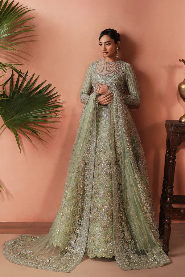 Crystal embellished Pakistani net bridal outfit in aqua green for Canadian brides, featuring handwork with sheesha, katdana, and soft net dupatta—ideal for modern Pakistani weddings in Canada.