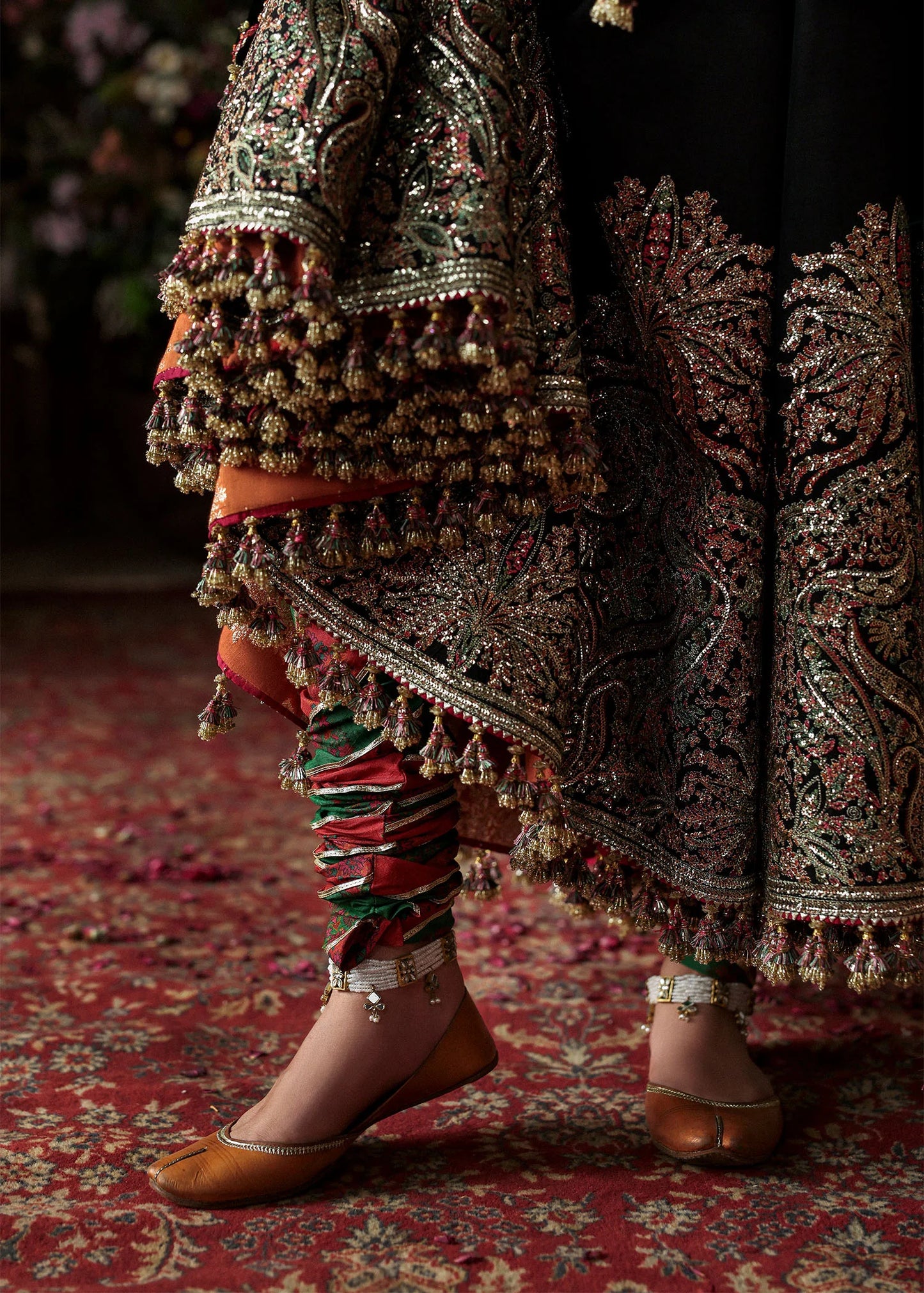Model wearing Noor Jehan luxury black Korean raw silk embroidered peshwas with churidar and chiffon foil printed dupatta – Hussain Rehar Massarat Festive 2025.