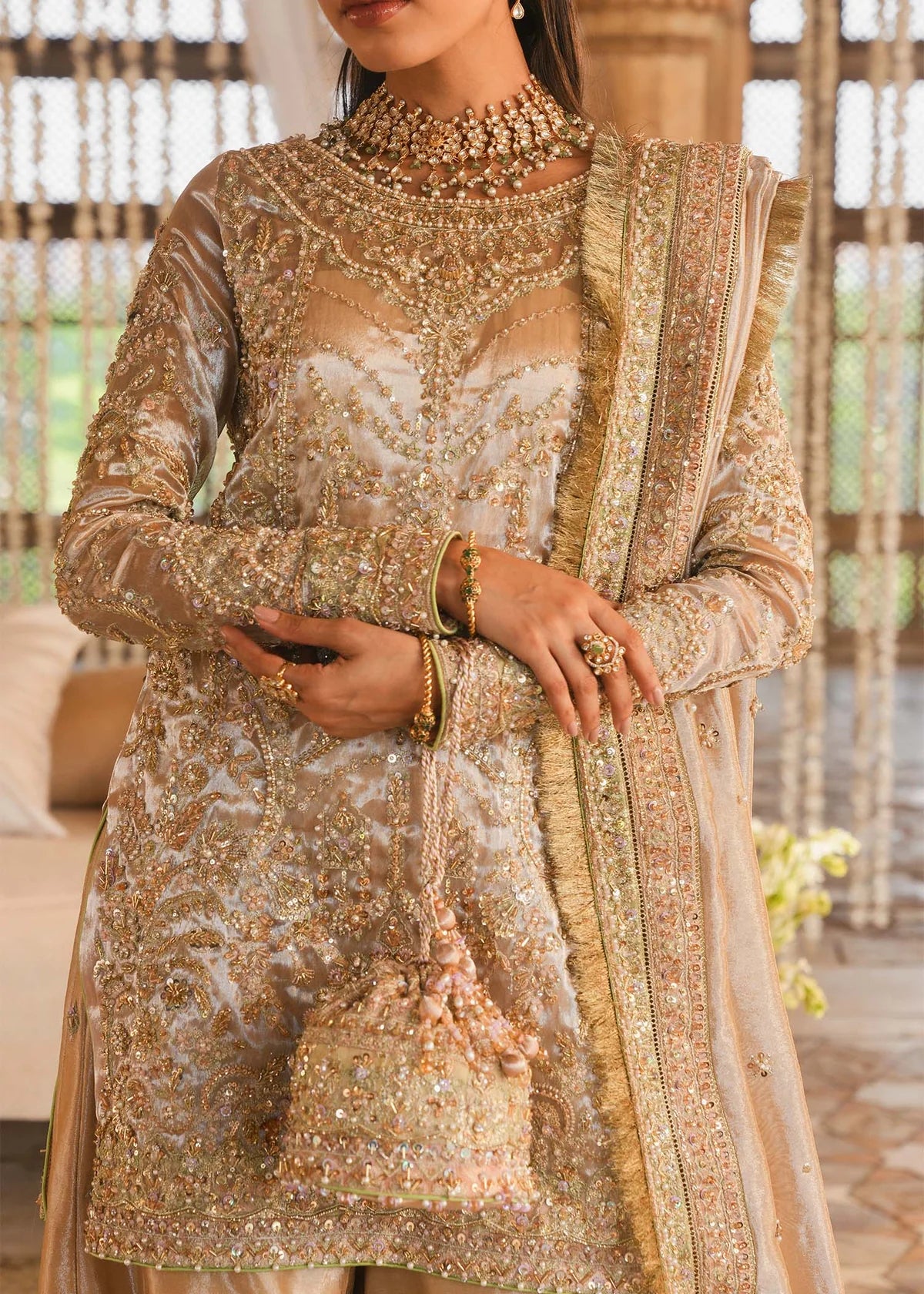 RESHAM – Gold bridal gharara suit in tissue with embroidery and dupatta. Stitched Pakistani wedding outfit online at Pakistanimoda.