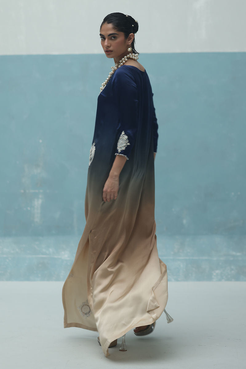 Blue Charmeuse silk kaftan with resham and crystal embroidery, paired with crepe silk pants and ombré silk scarf – Pakistani festive outfit.