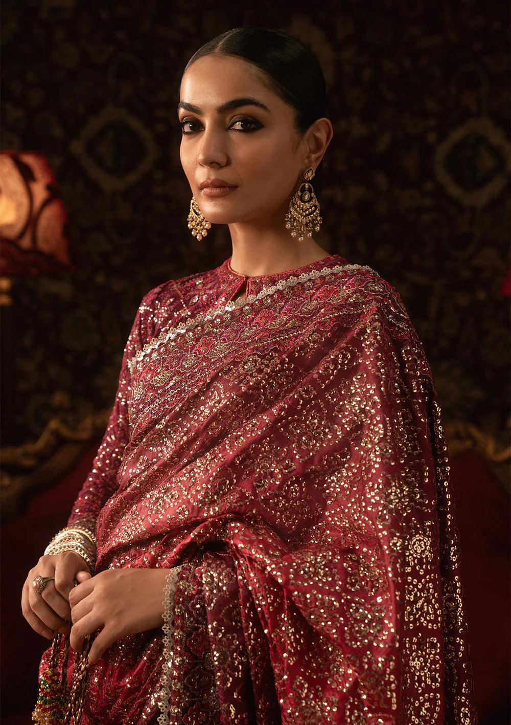 Aik Sari Edit ’25 Look 08 – Pakistani designer red embroidered silk saree stitched with blouse & petticoat, luxury wedding outfit at Pakistanimoda.