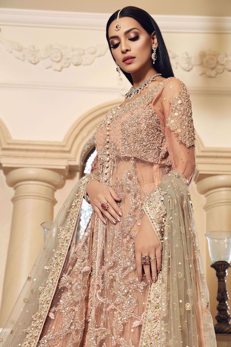 Singhar-Peach lehenga paired with tea pink Bridal Gown