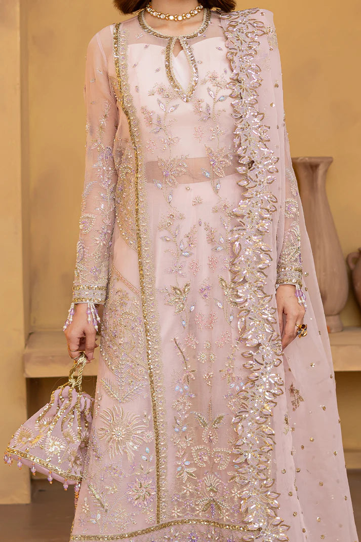 Soft pink embroidered organza dress with dupatta and silk trousers.