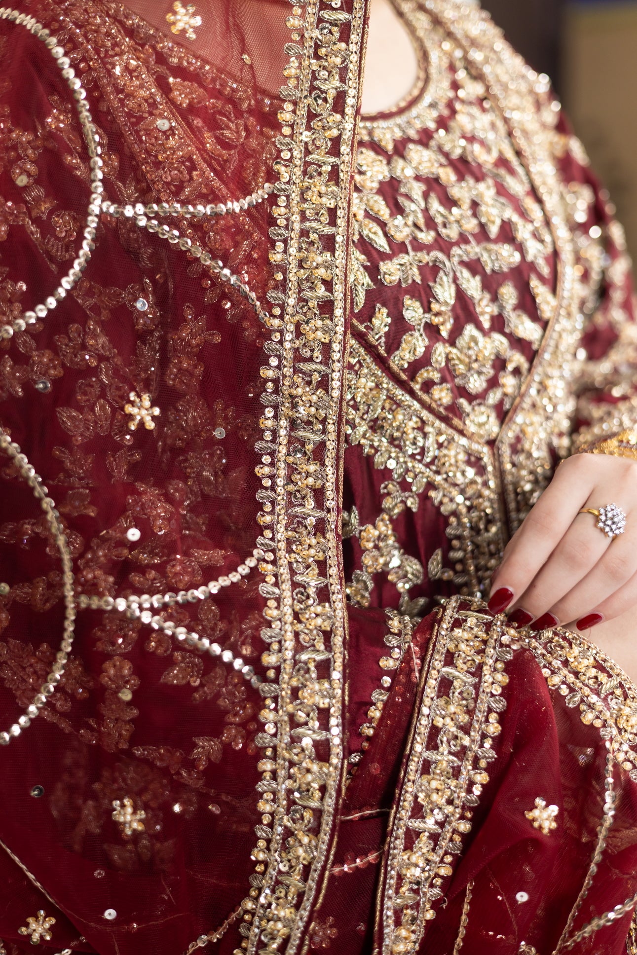 Yumna bridal ensemble by MariamRaj: Maroon raw silk front-open shirt, rust farshi lehnga, net organza dupatta, intricate embroidery for weddings and receptions