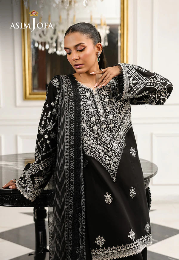 AJMCH-04 stitched black 3-piece cambric suit with embroidered neckline and sleeves, paired with a printed chiffon dupatta – Monochrome outfit for Pakistani women abroad