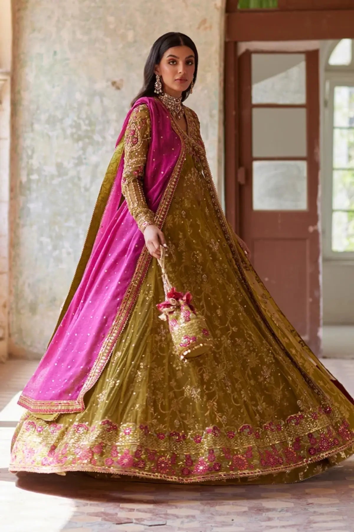 Aaliyah Olive Green Handworked Net Angrakha Mehndi Stitched Suit with Brocade Jamawar Pants, Magenta Khaddi Silk Dupatta and Embellished Pouch
