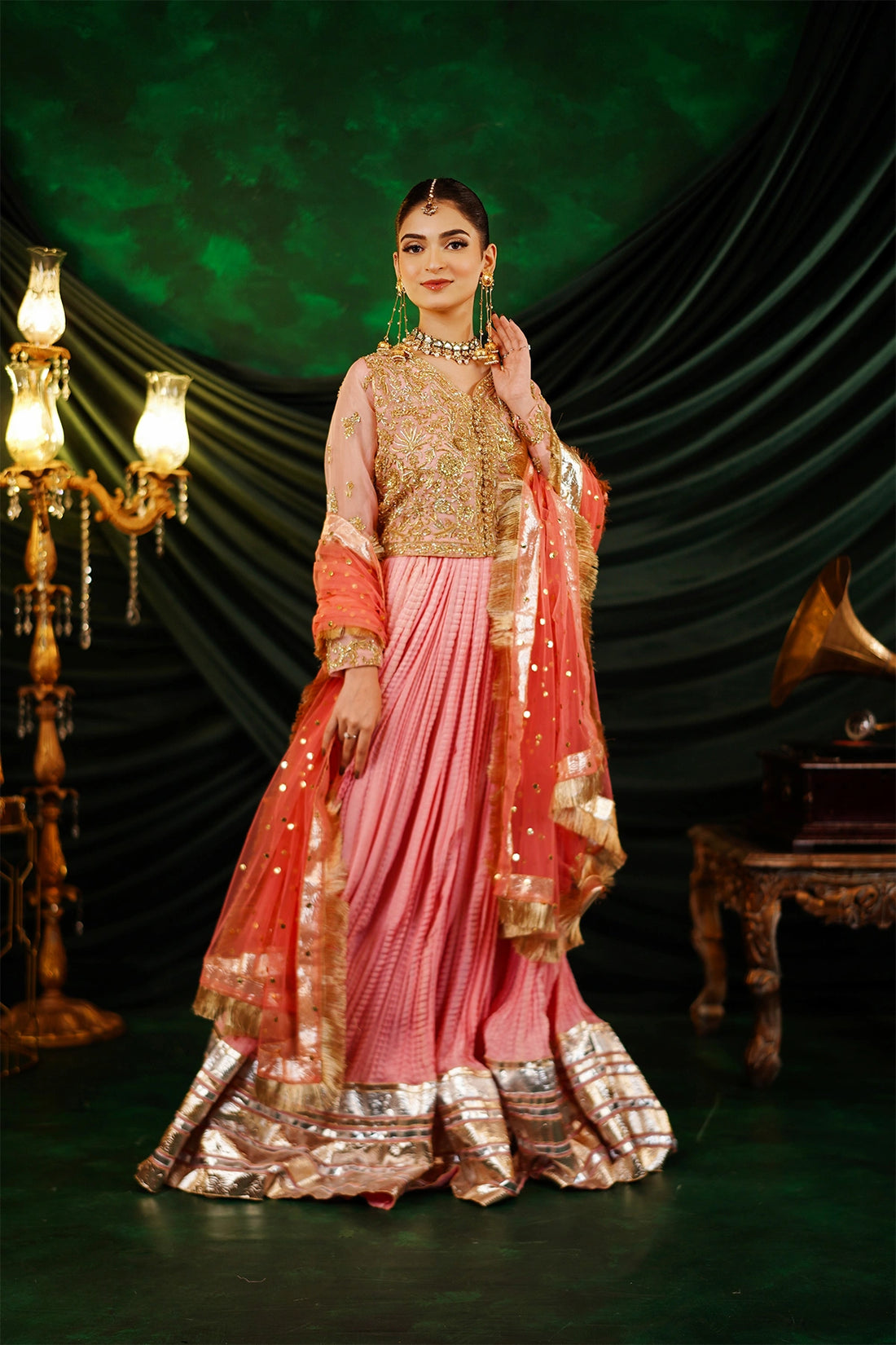Abeer peach embellished organza blouse with Thai silk crushed palazzo and kamdani net dupatta by MariamRaj