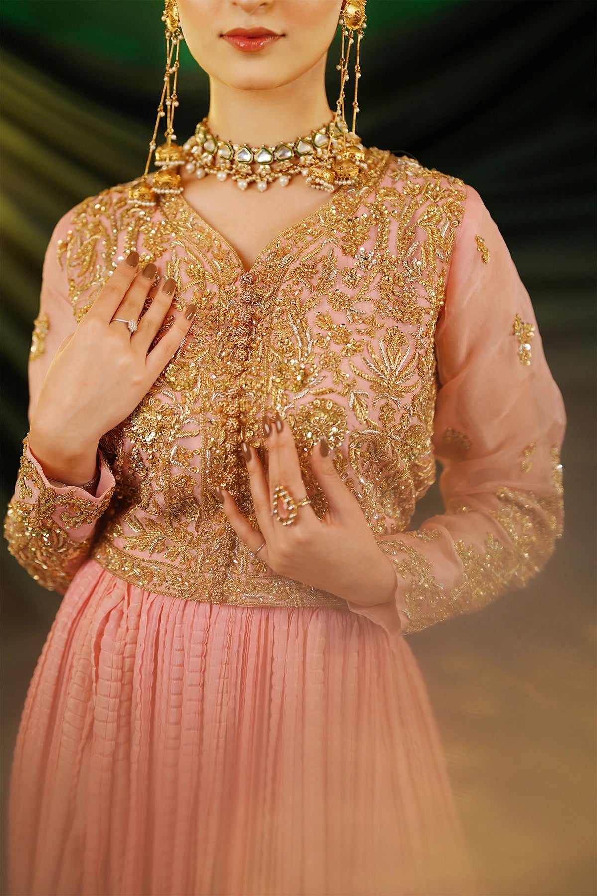 Abeer peach embellished organza blouse with Thai silk crushed palazzo and kamdani net dupatta by MariamRaj