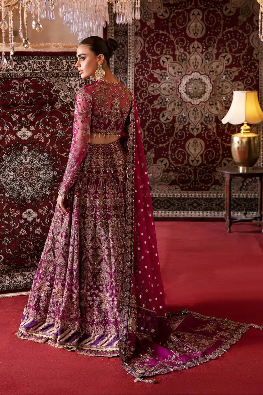 Abir Afrozeh magenta festive net embroidered lehenga choli with zari organza dupatta by Pakistanimoda.