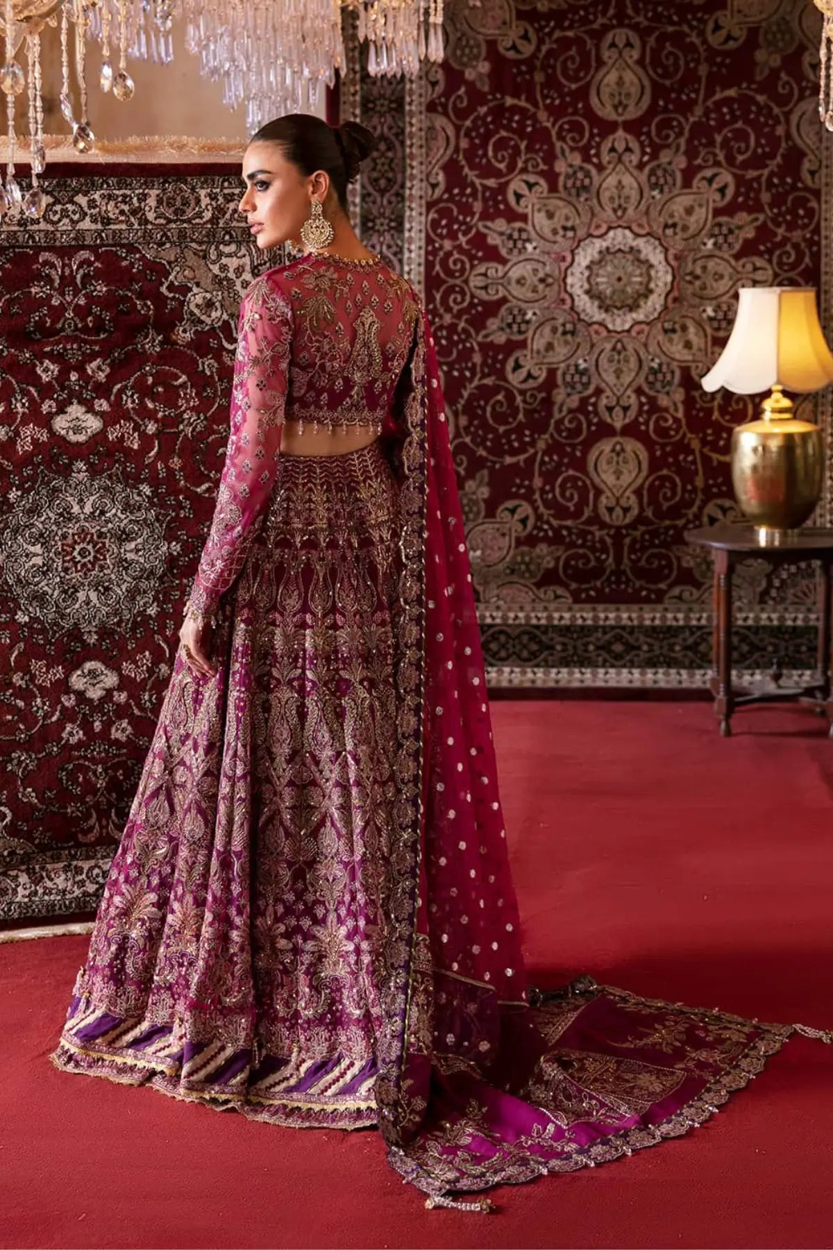 Abir Afrozeh magenta festive net embroidered lehenga choli with zari organza dupatta by Pakistanimoda.