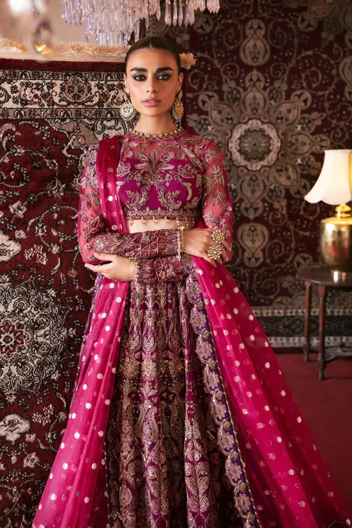 Abir Afrozeh magenta festive net embroidered lehenga choli with zari organza dupatta by Pakistanimoda.