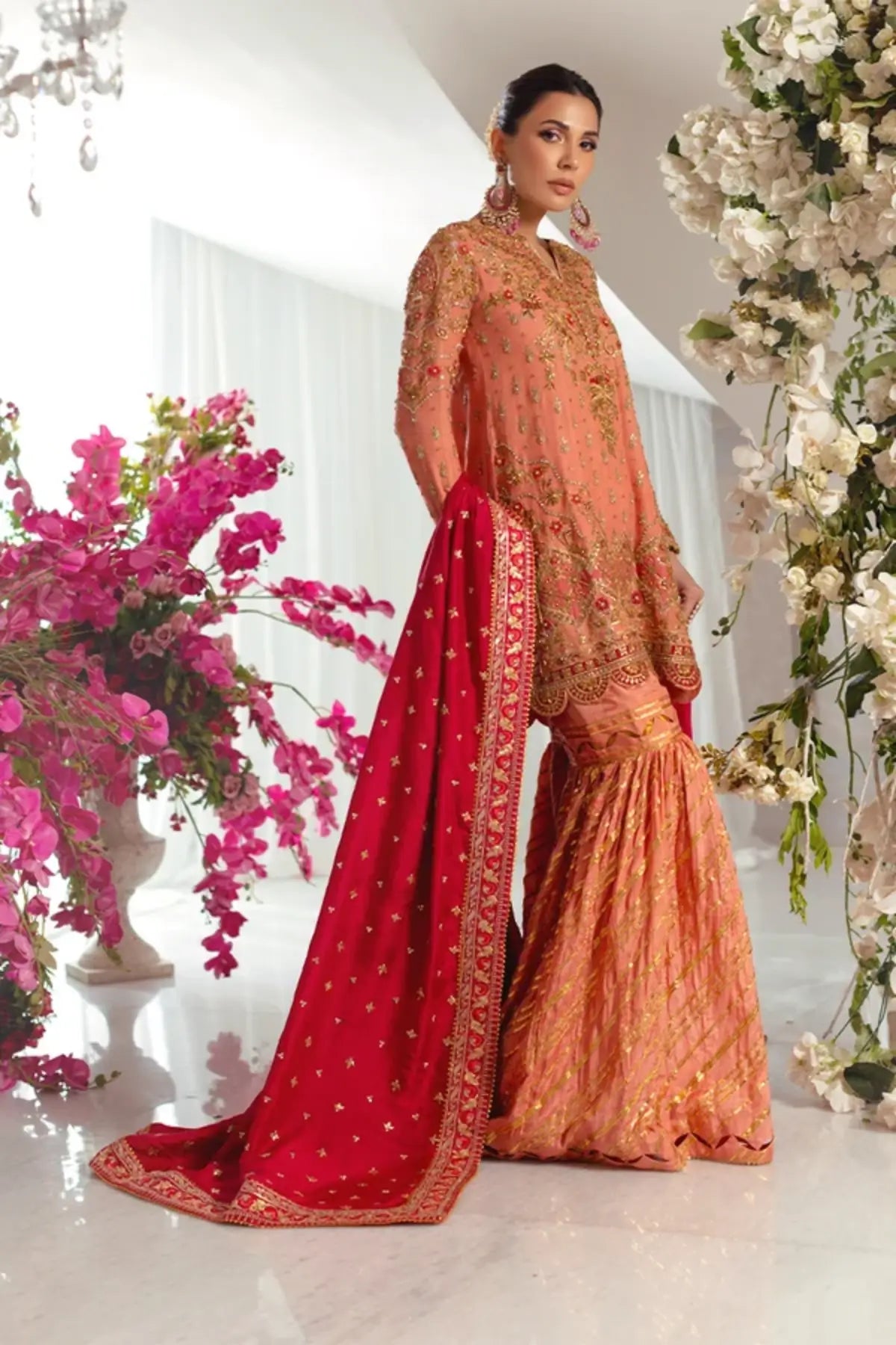 Afareen Peach Orange Embroidered Silk Net Sangeet Stitched Suit with Gold Embellishments, Cotton Silk Dhaka Pants and Red Raw Silk Dupatta