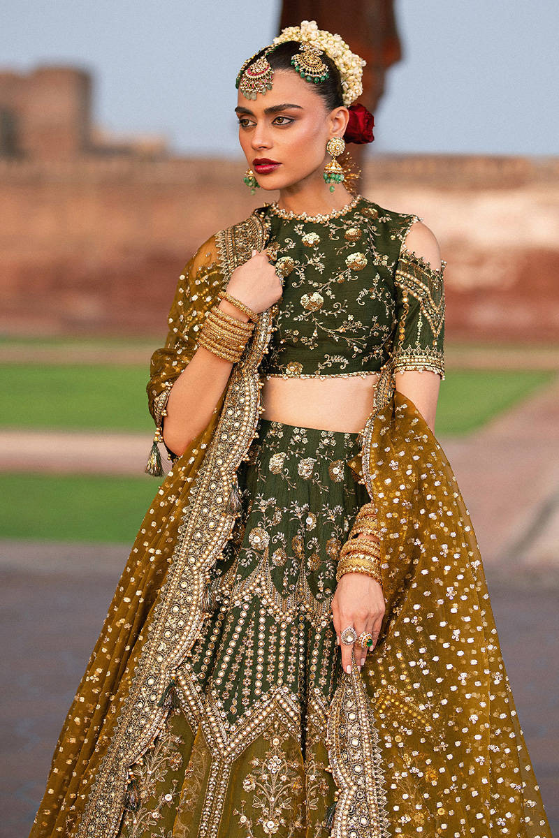 Afsana MNR Zarlish Vol VI green silk lehenga choli with gold embroidered dupatta, stitched festive outfit available at Pakistanimoda with USA delivery.