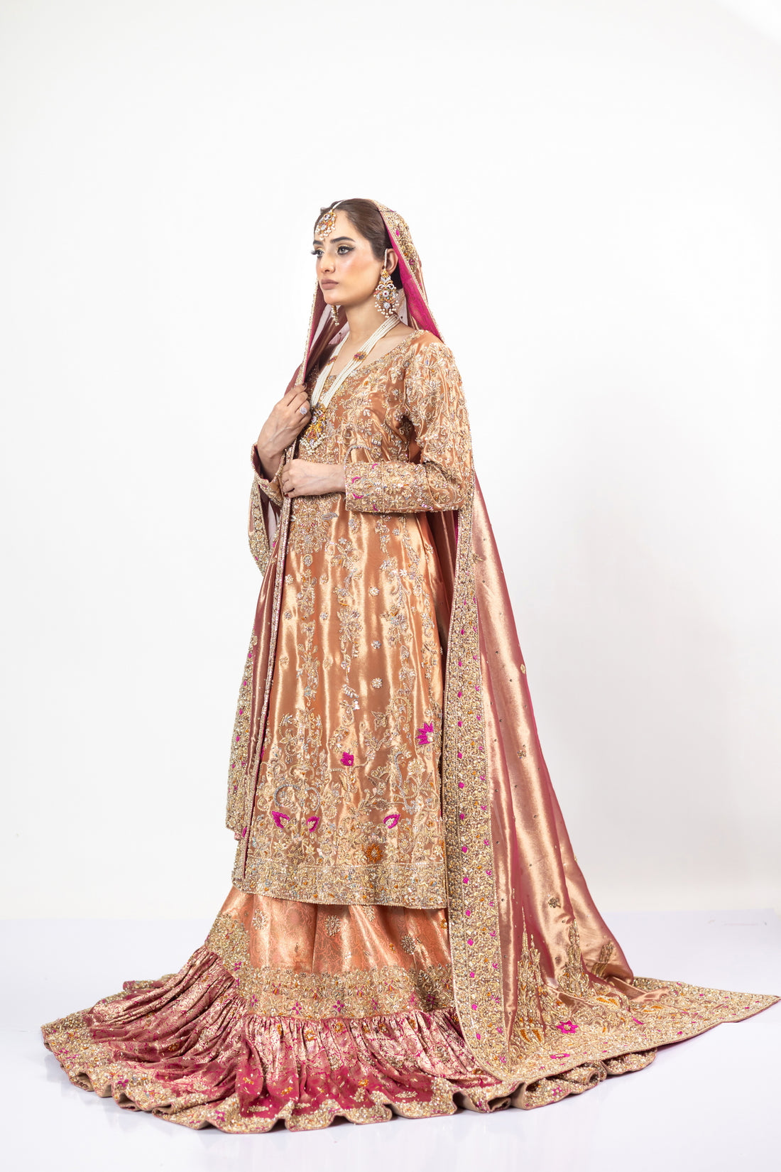 Afsheen bridal outfit by MariamRaj: Peach gold or magenta pink tissue silk Pishwas, Jamawar Gharara, delicate tissue dupatta, zardoze and resham embroidery for weddings