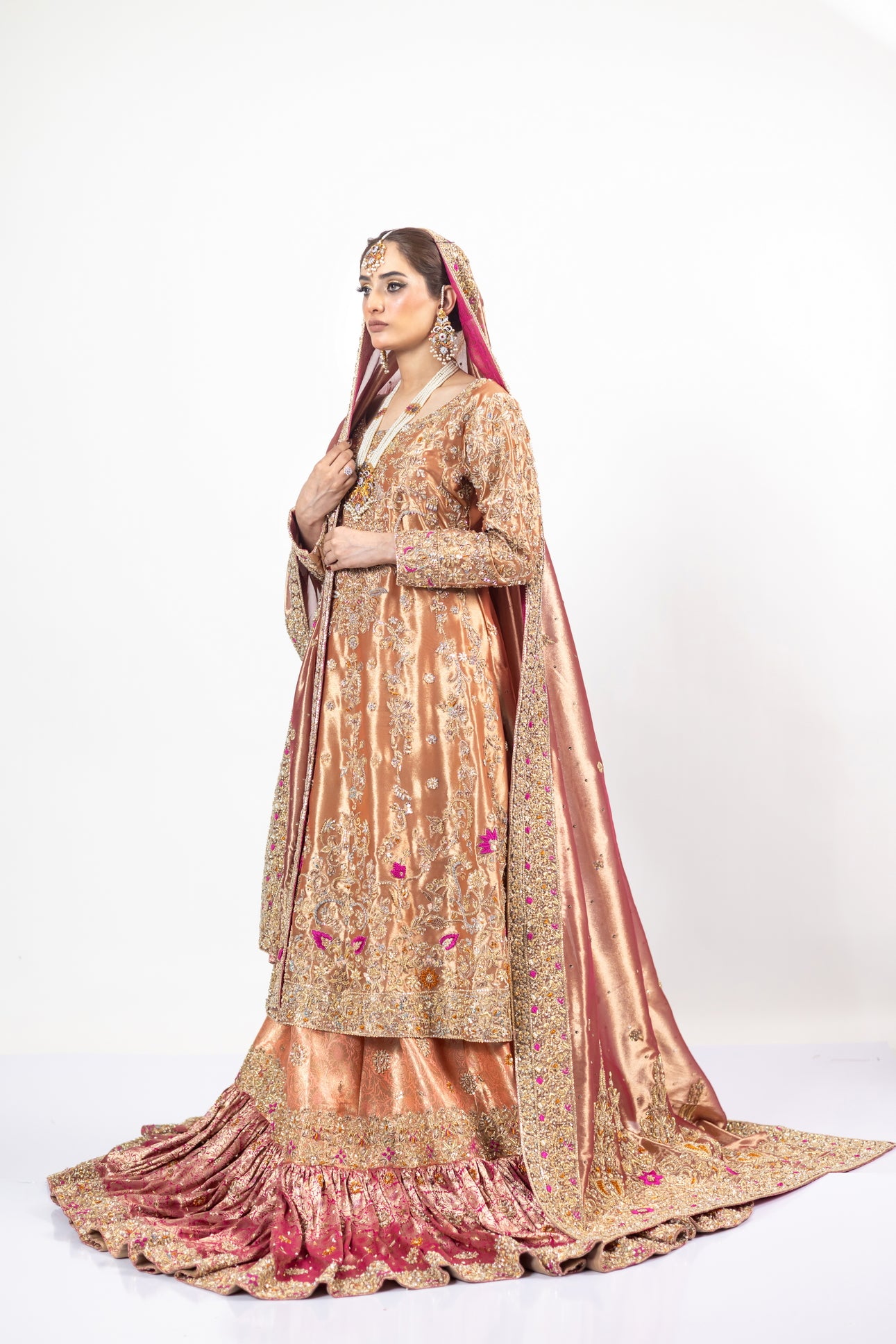 Afsheen bridal outfit by MariamRaj: Peach gold or magenta pink tissue silk Pishwas, Jamawar Gharara, delicate tissue dupatta, zardoze and resham embroidery for weddings