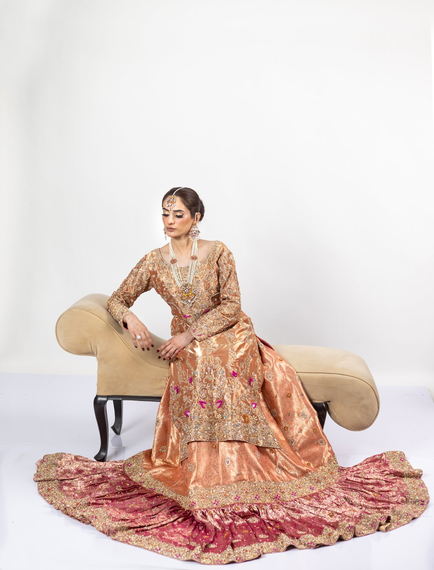 Afsheen bridal outfit by MariamRaj: Peach gold or magenta pink tissue silk Pishwas, Jamawar Gharara, delicate tissue dupatta, zardoze and resham embroidery for weddings