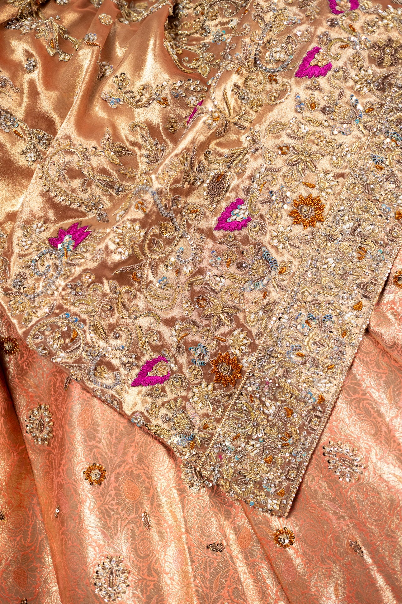 Afsheen bridal outfit by MariamRaj: Peach gold or magenta pink tissue silk Pishwas, Jamawar Gharara, delicate tissue dupatta, zardoze and resham embroidery for weddings
