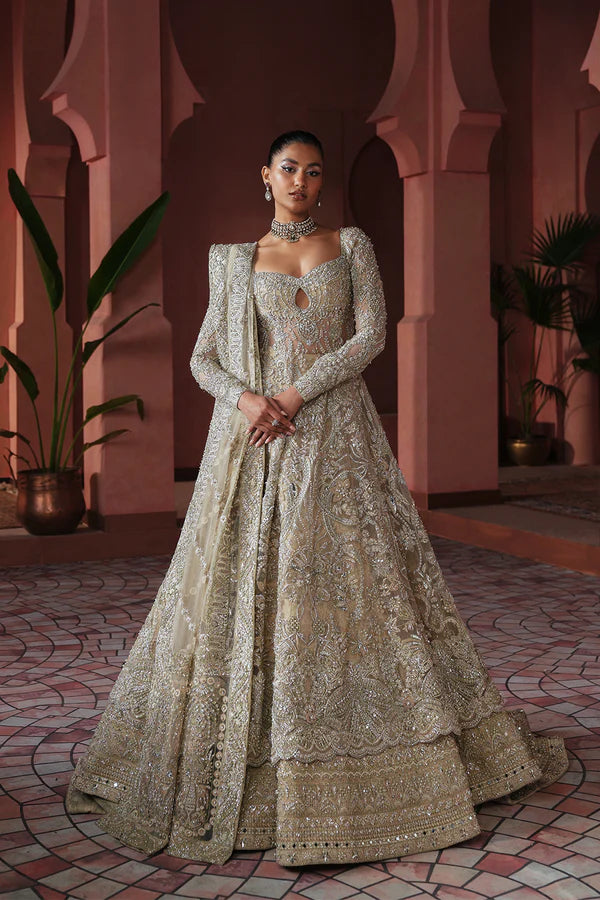 Ivory beige Pakistani bridal dress with farshi lehenga and net gown for USA brides, featuring handcrafted zardozi embroidery and a royal, flowing silhouette.