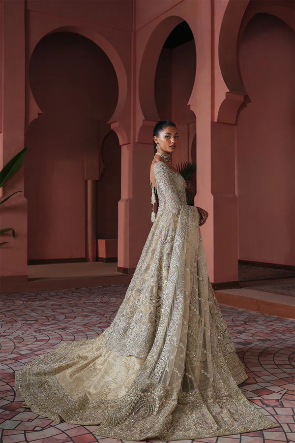 Ivory beige Pakistani bridal dress with farshi lehenga and net gown for USA brides, featuring handcrafted zardozi embroidery and a royal, flowing silhouette.