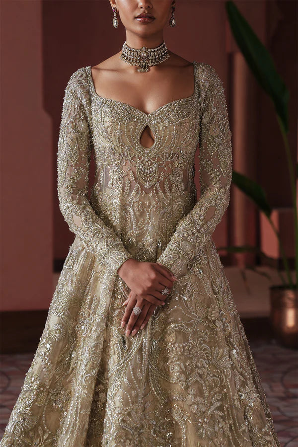 Ivory beige Pakistani bridal dress with farshi lehenga and net gown for USA brides, featuring handcrafted zardozi embroidery and a royal, flowing silhouette.