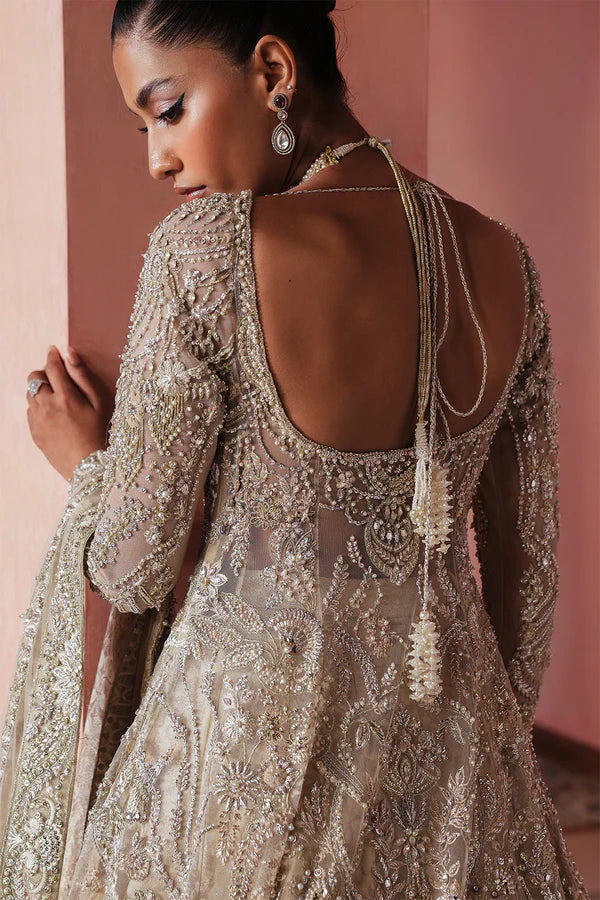 Ivory beige Pakistani bridal dress with farshi lehenga and net gown for USA brides, featuring handcrafted zardozi embroidery and a royal, flowing silhouette.