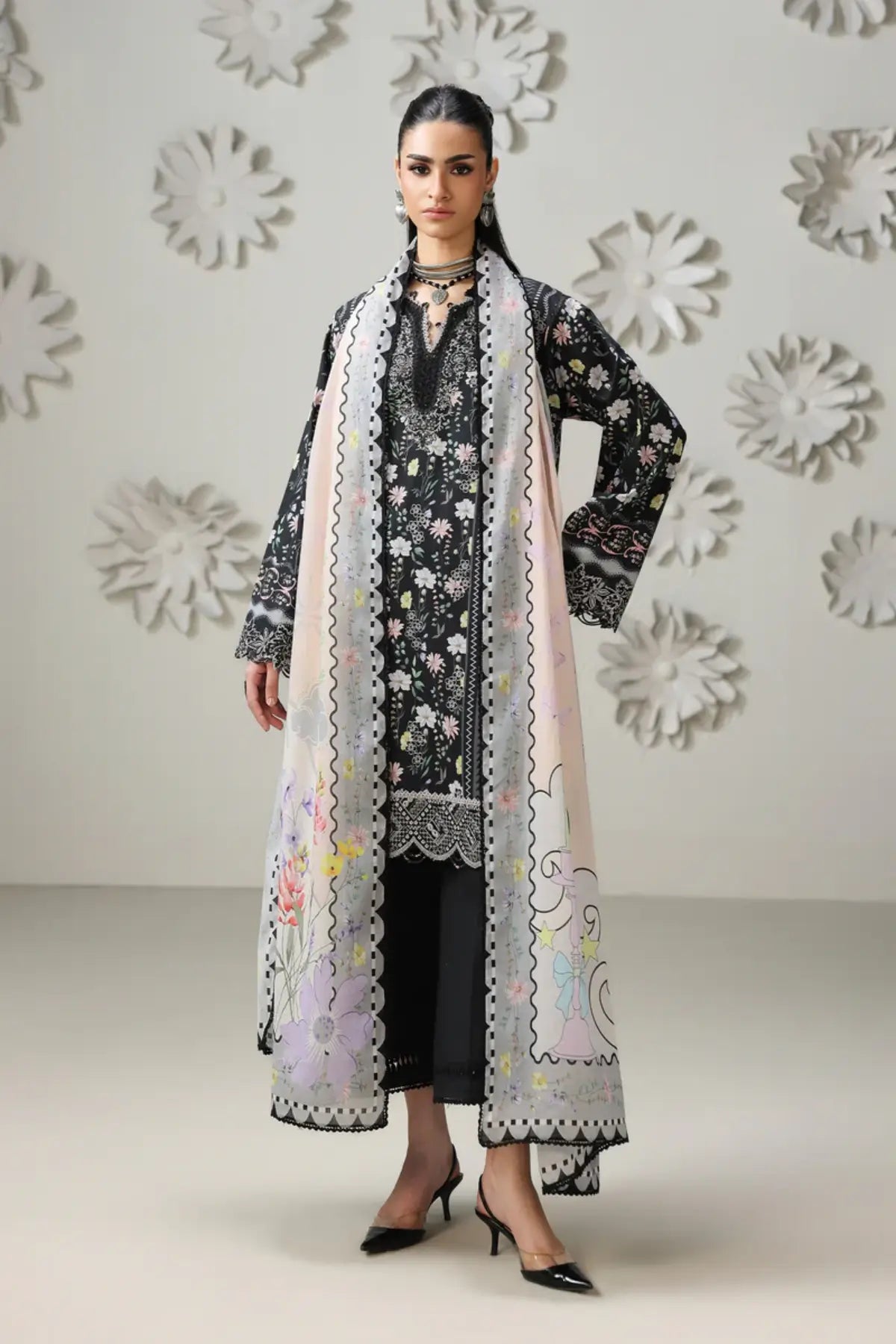 Amel QQP-08(A) by Qalamkar black floral lawn stitched 3PC suit with chikankari embroidery, printed lawn dupatta, and plain cotton trousers.
