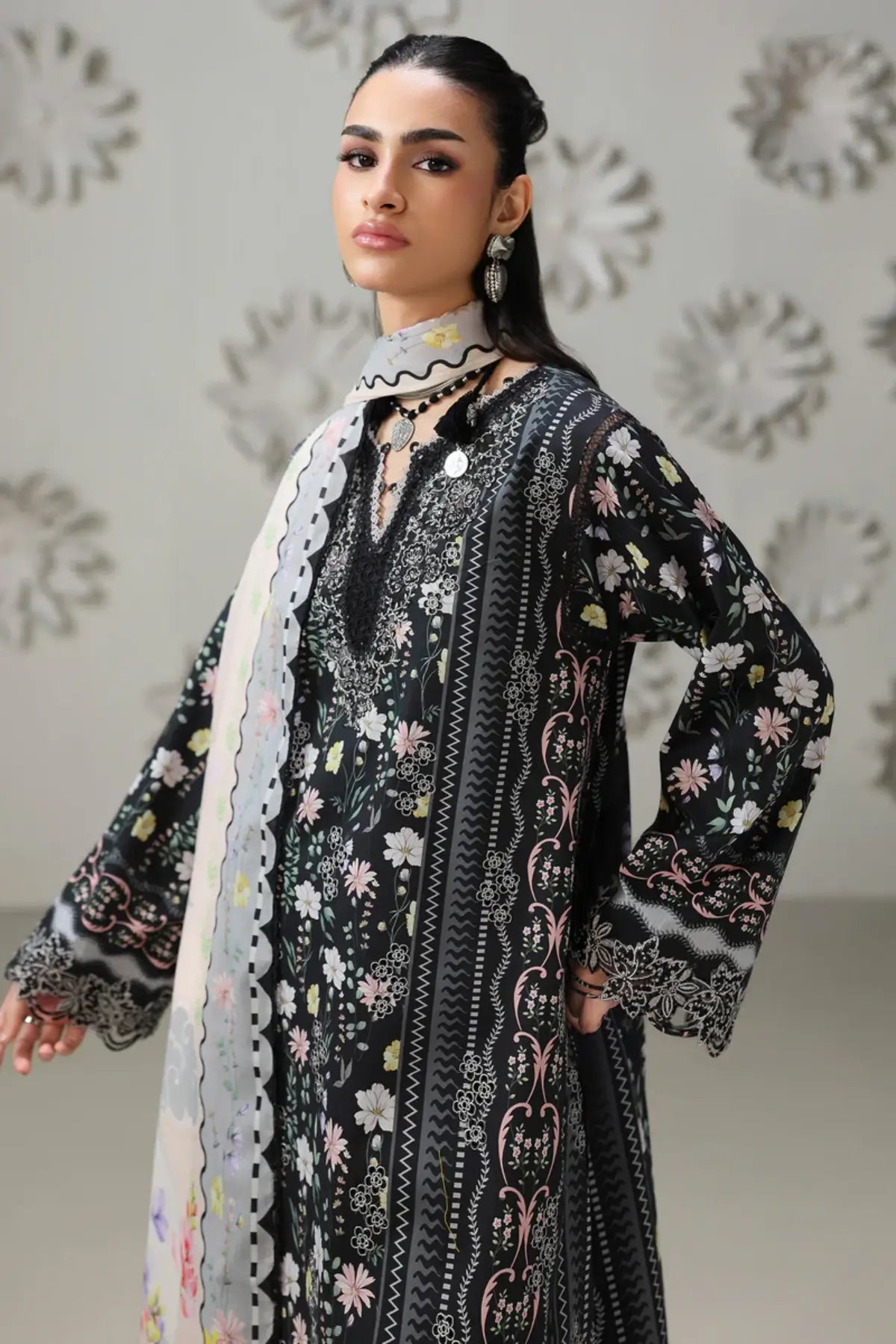 Amel QQP-08(A) by Qalamkar black floral lawn stitched 3PC suit with chikankari embroidery, printed lawn dupatta, and plain cotton trousers.