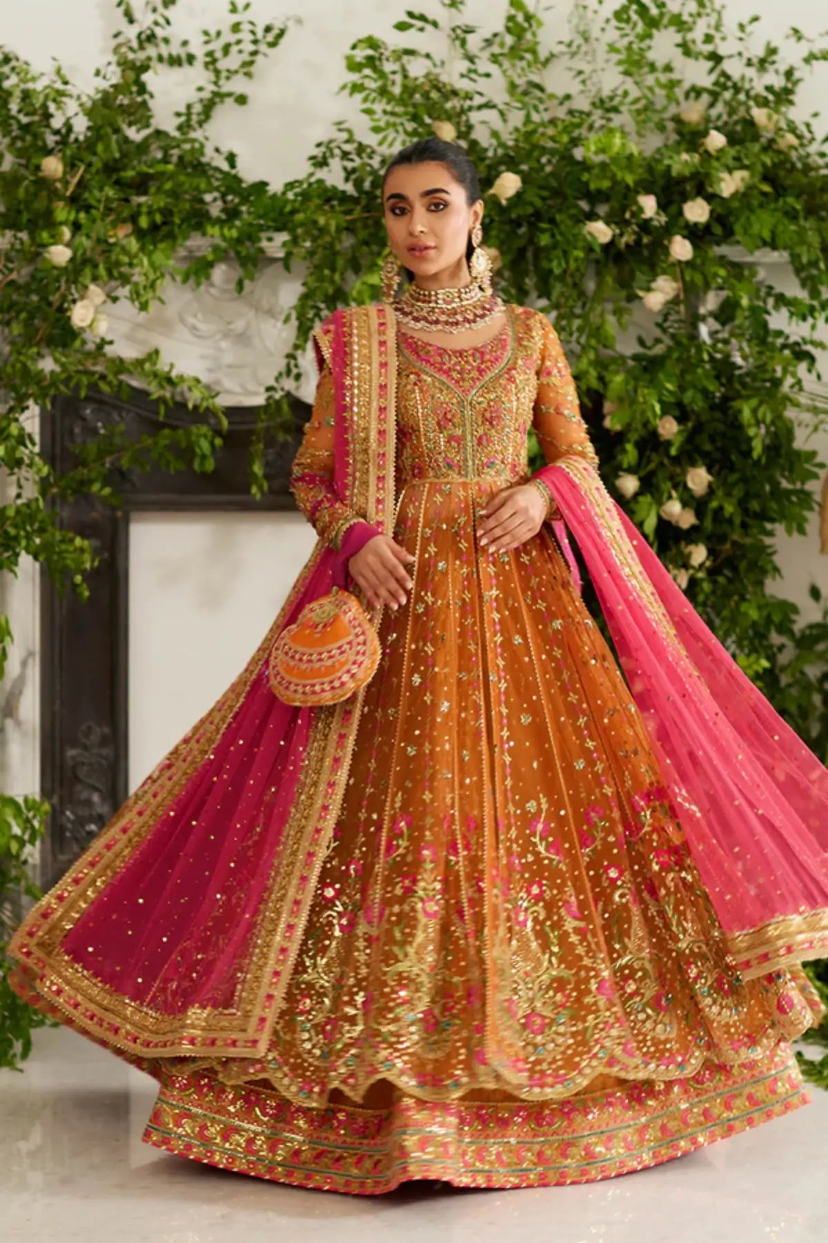 Amelia Saffron and Pink Embellished Net Mehndi Bridal Pishwas with Gold Floral Work, Lame Tissue Lehenga, Pink Net Dupatta and Embroidered Pouch