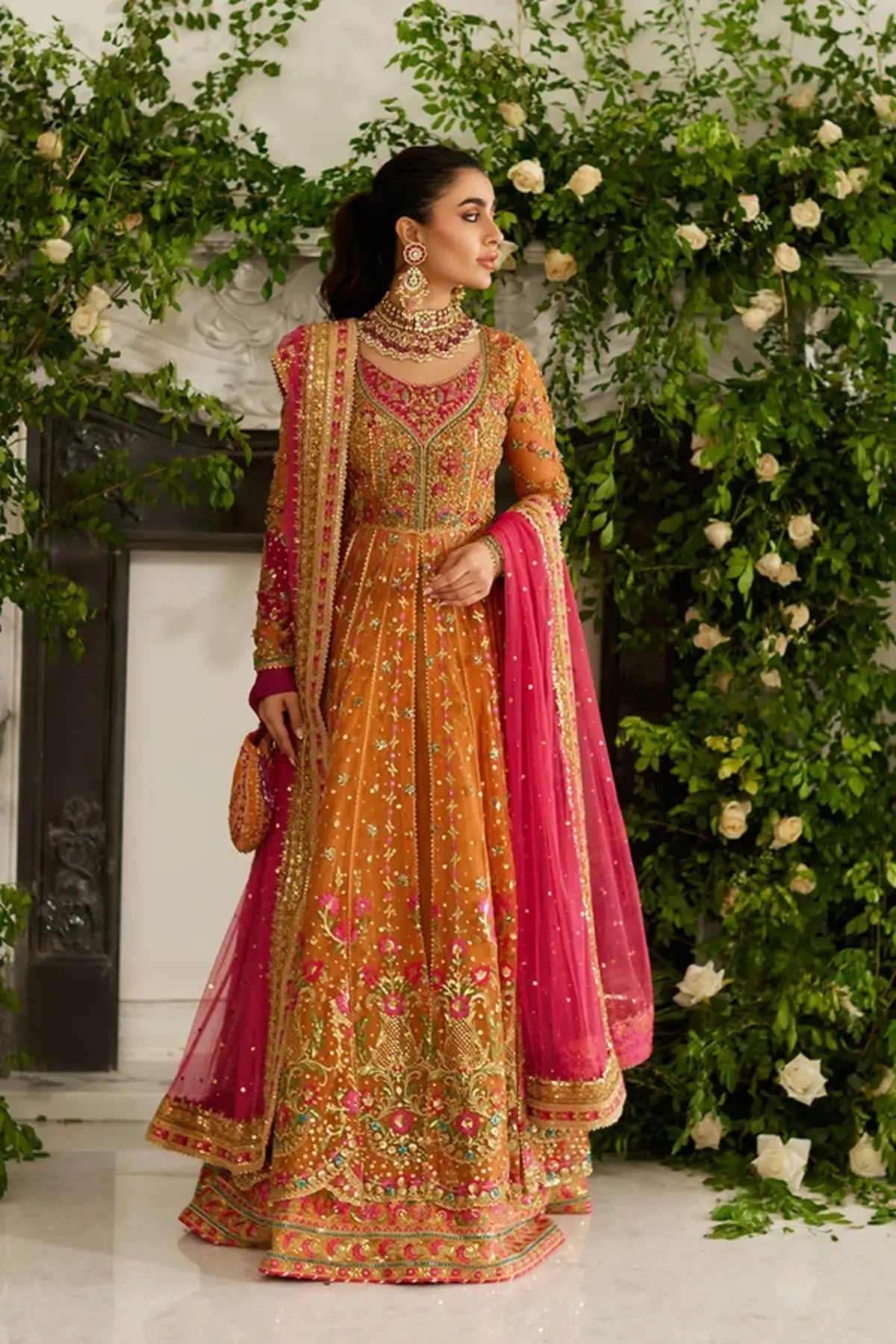 Amelia Saffron and Pink Embellished Net Mehndi Bridal Pishwas with Gold Floral Work, Lame Tissue Lehenga, Pink Net Dupatta and Embroidered Pouch