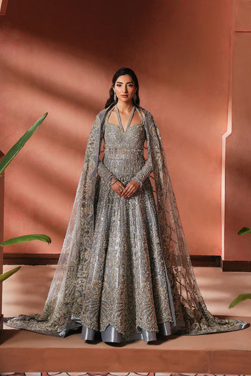 Designer moonlight blue Pakistani bridal lehenga for USA weddings, featuring a luxe tissue skirt and net dupatta, hand-embellished with naqshi and dabka embroidery.