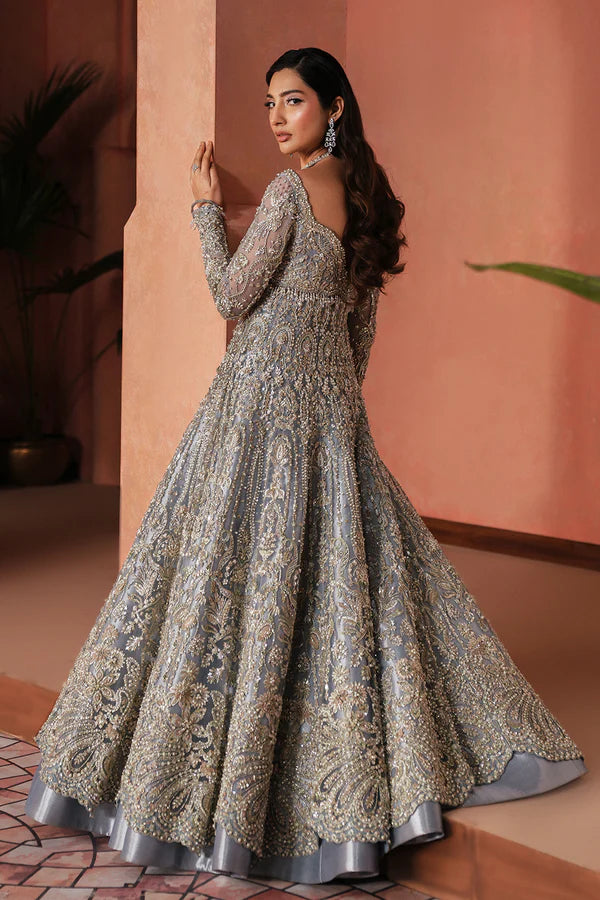 Designer moonlight blue Pakistani bridal lehenga for USA weddings, featuring a luxe tissue skirt and net dupatta, hand-embellished with naqshi and dabka embroidery.