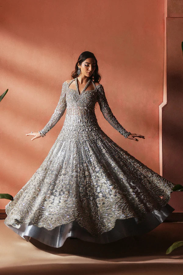 Designer moonlight blue Pakistani bridal lehenga for USA weddings, featuring a luxe tissue skirt and net dupatta, hand-embellished with naqshi and dabka embroidery.