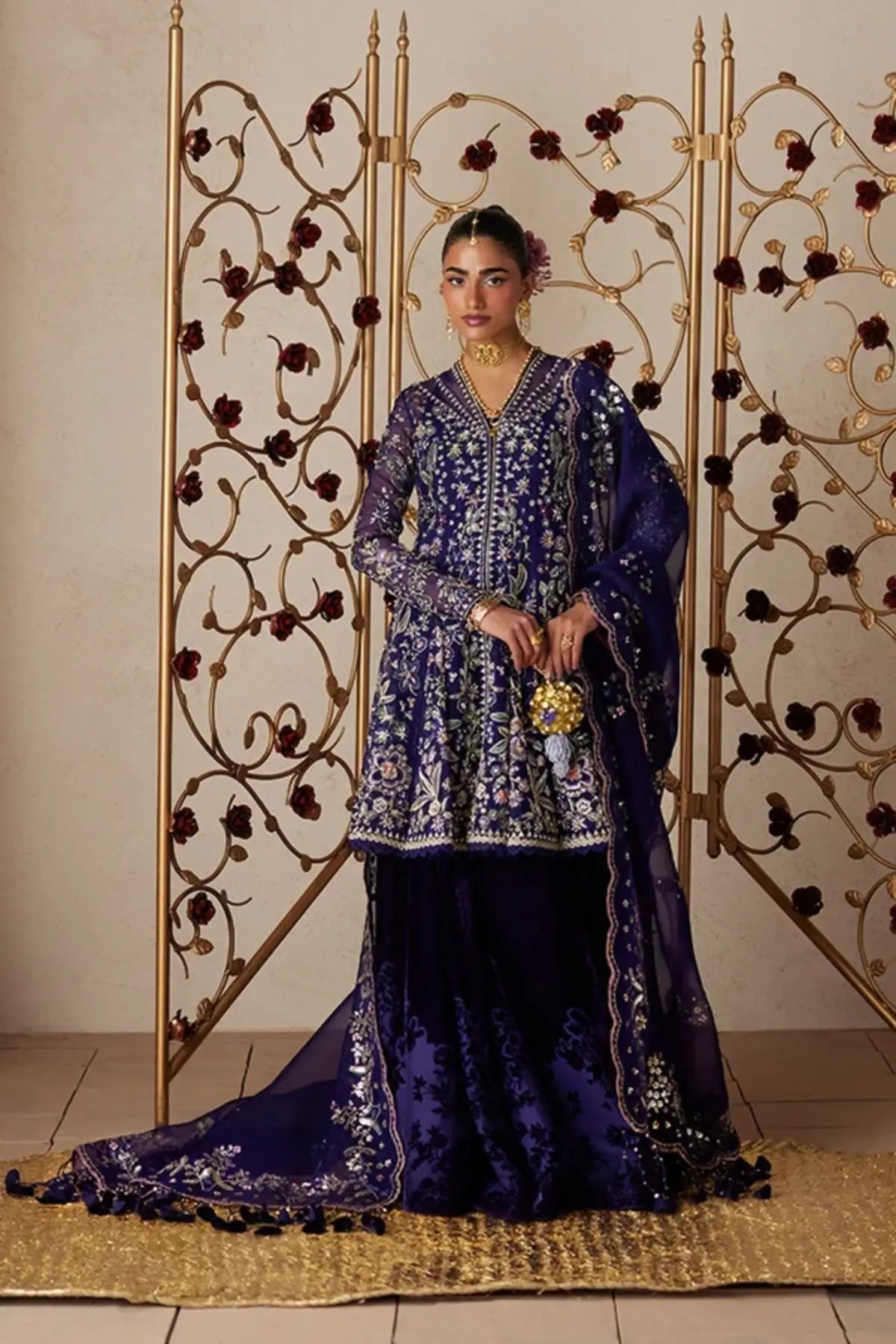Anoush violet embroidered organza peplum velvet sharara suit with pink lilac embroidery, silver accents and sequin embellished dupatta