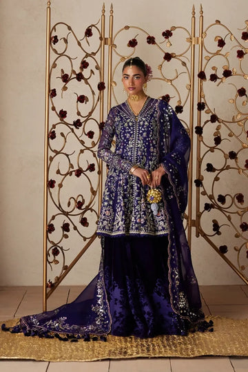 Anoush violet embroidered organza peplum velvet sharara suit with pink lilac embroidery, silver accents and sequin embellished dupatta