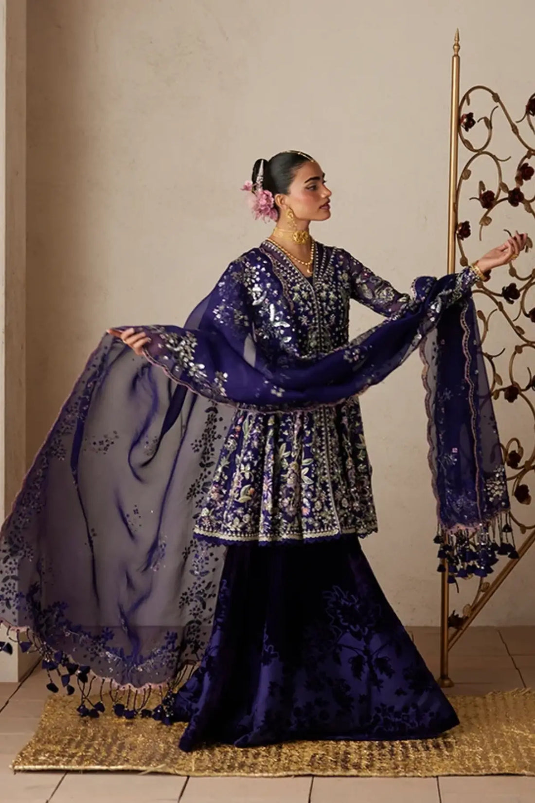Anoush violet embroidered organza peplum velvet sharara suit with pink lilac embroidery, silver accents and sequin embellished dupatta