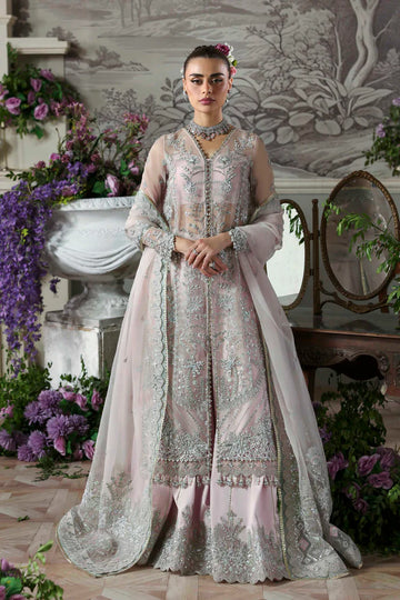 Anvaha luxury pastel pink organza bridal ensemble with lehenga and dupatta by Akbar Aslam, hand-embellished couture for festive wear and weddings.