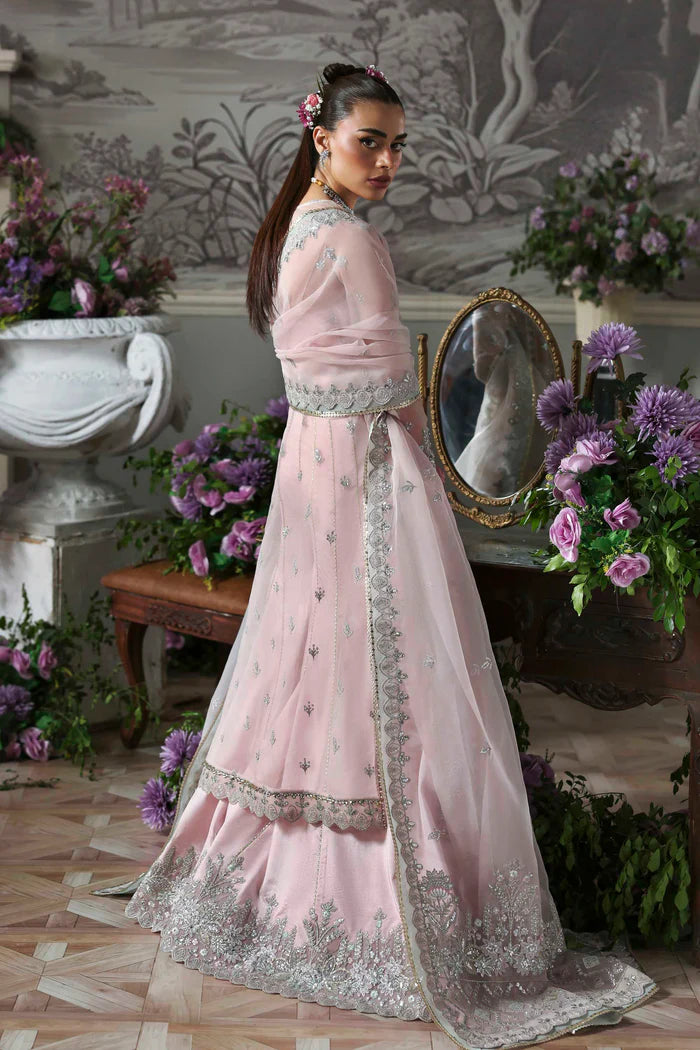 Anvaha luxury pastel pink organza bridal ensemble with lehenga and dupatta by Akbar Aslam, hand-embellished couture for festive wear and weddings.