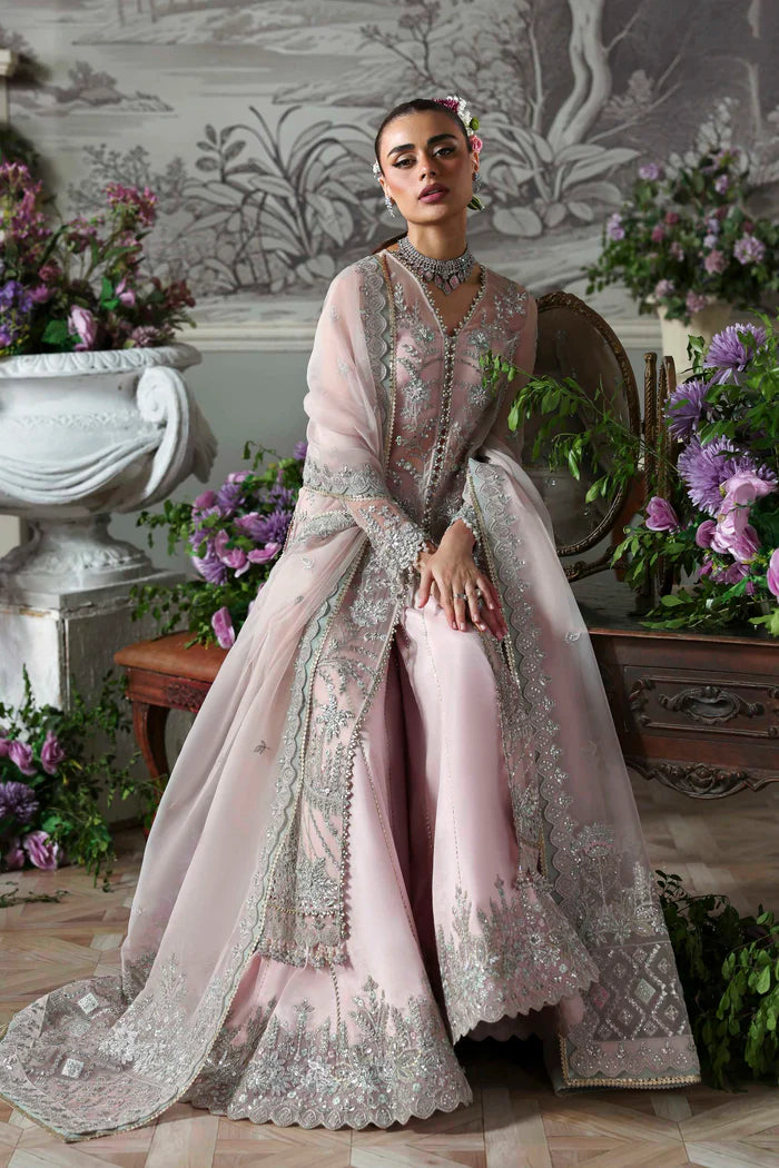 Anvaha luxury pastel pink organza bridal ensemble with lehenga and dupatta by Akbar Aslam, hand-embellished couture for festive wear and weddings.