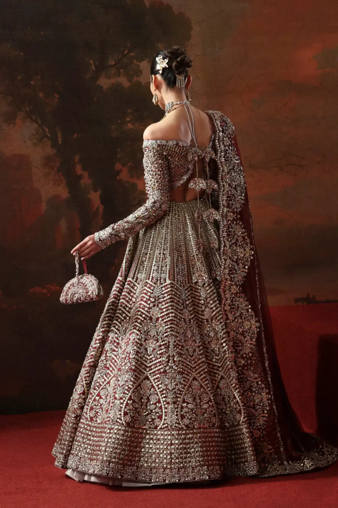 Arizel burgundy couture bridal lehenga choli from Akbar Aslam Serena Bridal Edit '26 crafted in organza with silk inner.