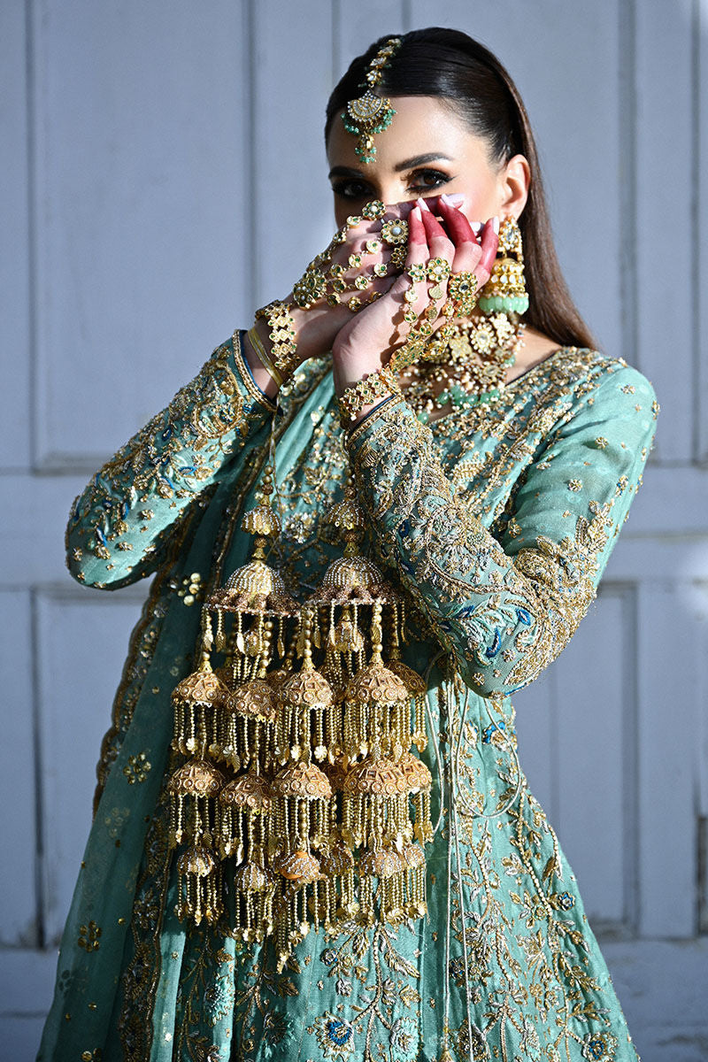 Sage green angharka-style Pakistani bridal kalidaar with jamawar lehenga and kamdani dupatta – ideal for brides in the USA.
