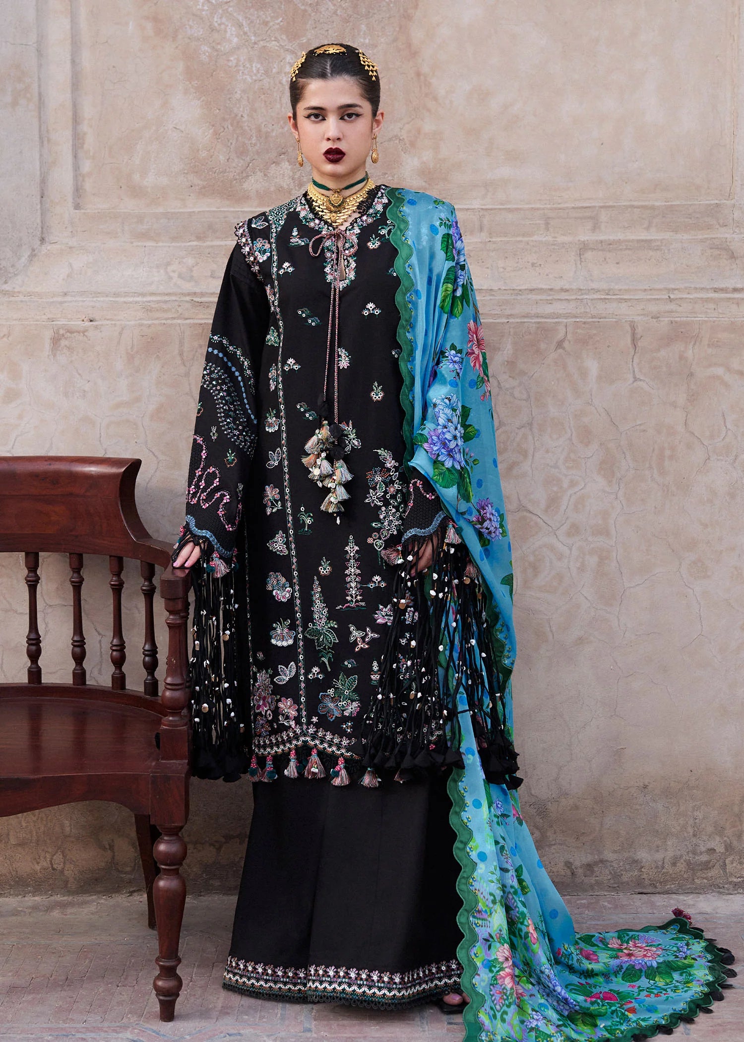 Arzo-Classic black suit with colorful floral threadwork by-Hussain rehar