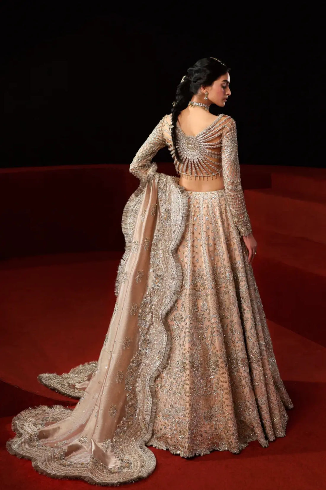 Asteria peach embellished lehenga choli from Akbar Aslam Serena Bridal Edit '26 crafted in organza with silk inner.