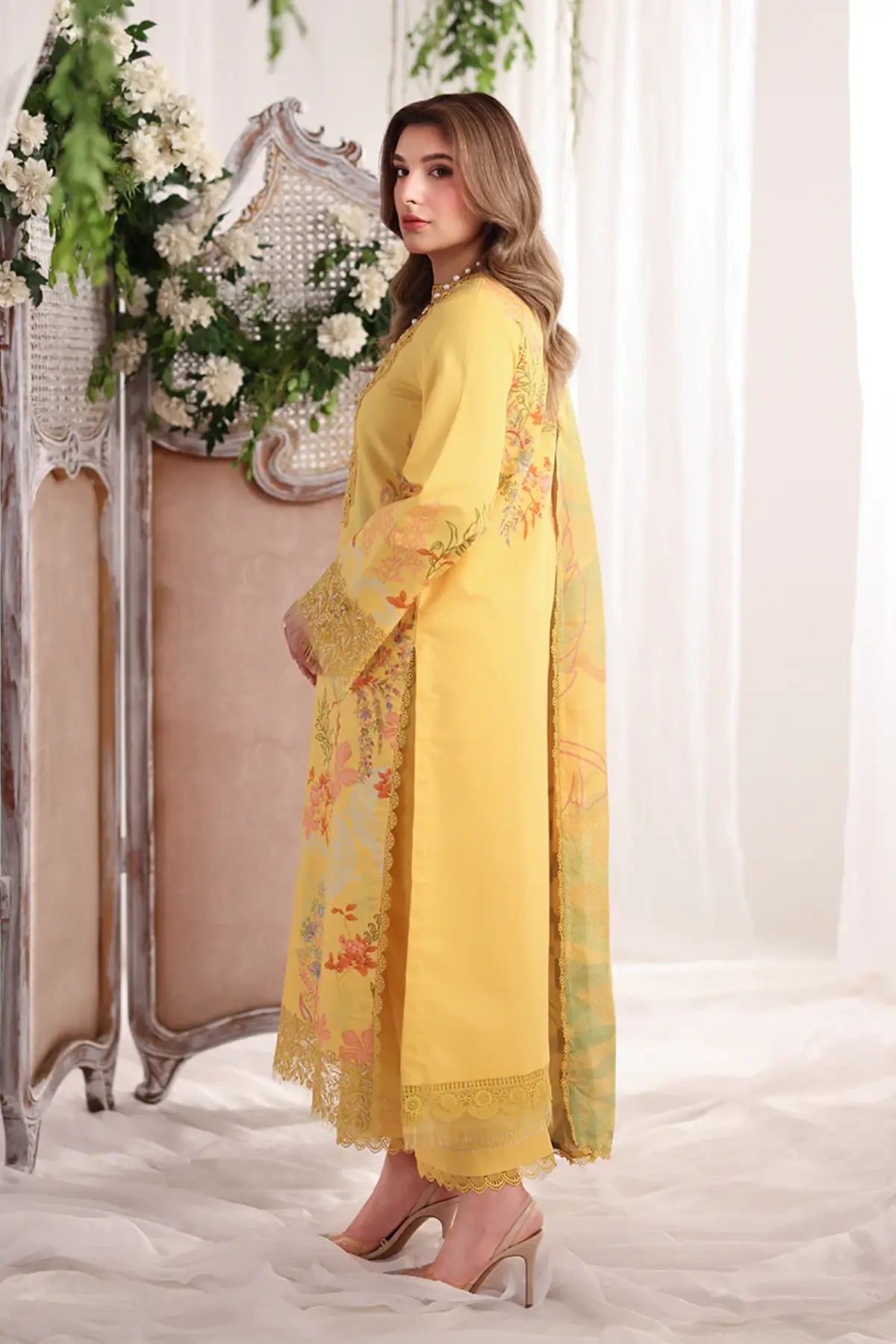 Aurora Rang Rasiya Marigold embroidered lawn stitched suit with Schiffli neckline, organza borders, gold crush dupatta and cotton trousers