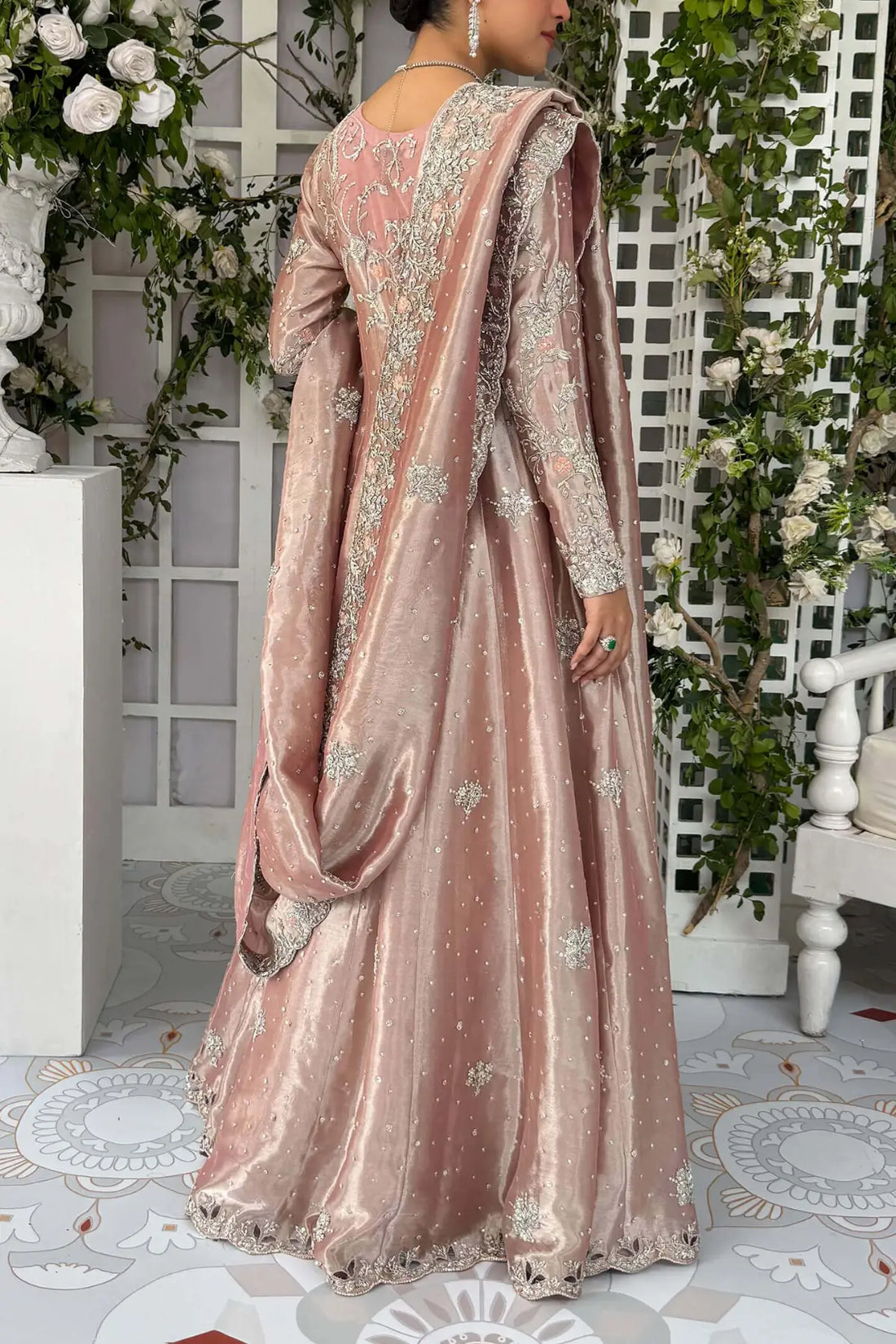 Ava blush pink Pakistani bridal stitched gown in pure lamé tissue with heavy neckline and Swarovski detailing.