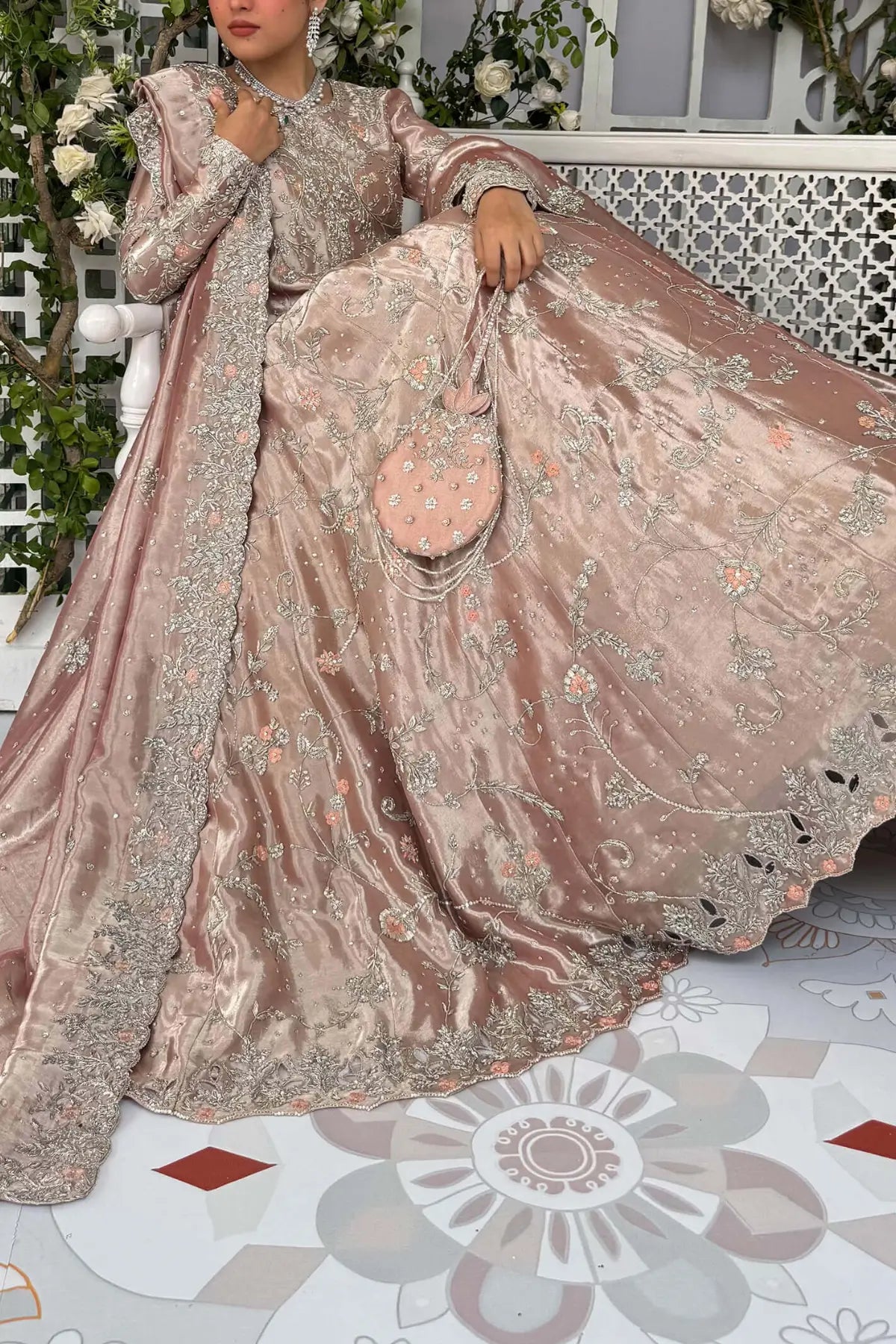 Ava blush pink Pakistani bridal stitched gown in pure lamé tissue with heavy neckline and Swarovski detailing.