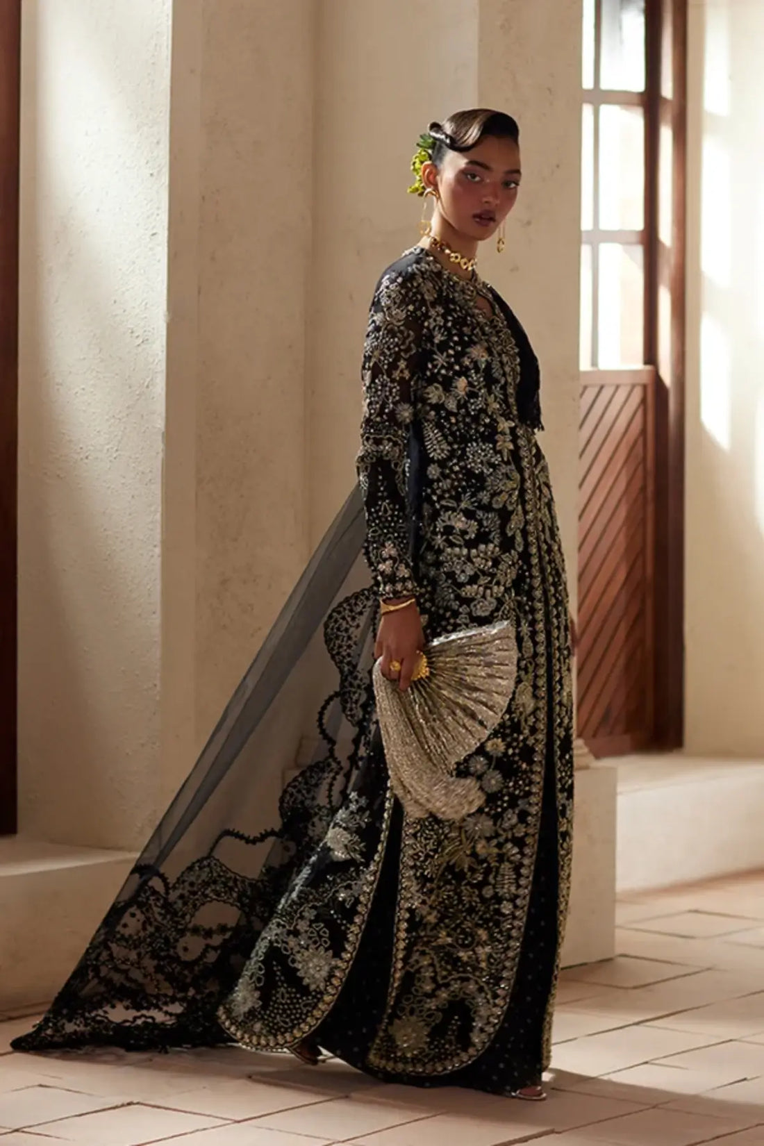 Avinaa black embroidered organza wedding formal gown with blue grey embroidery, gold embellishments, net drape and raw silk trousers